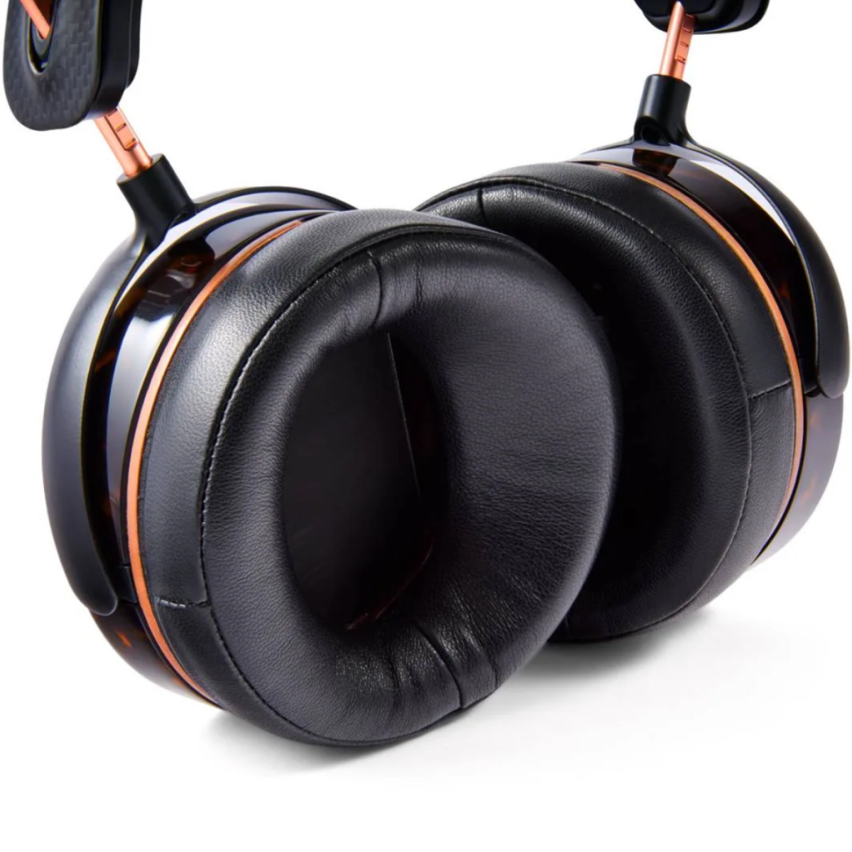 Black over-ear headphones with orange accents on a white background